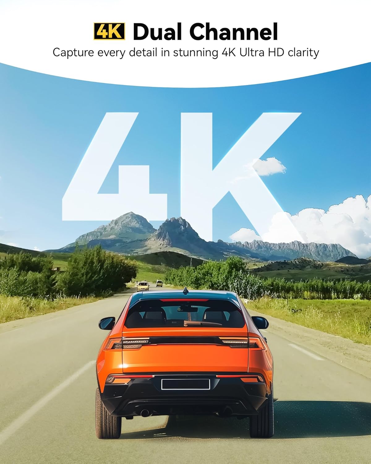 Orange car on a road with mountains in the background, featuring 4K Dual Channel text.